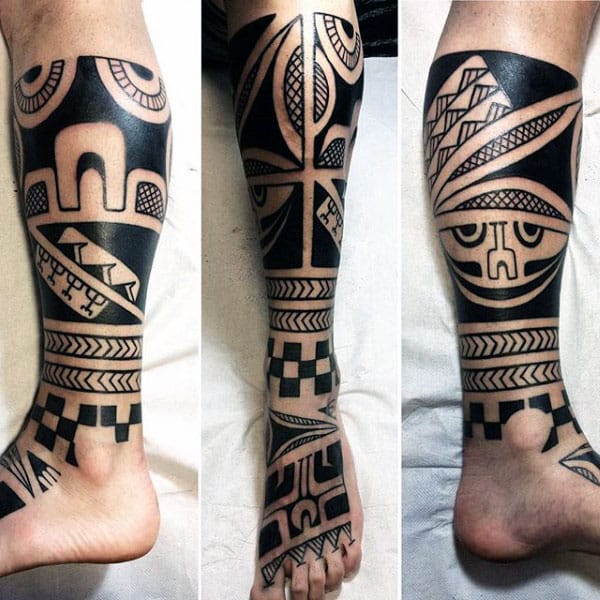 Man With Awesome Tribal Owl Leg Sleeve Tattoo