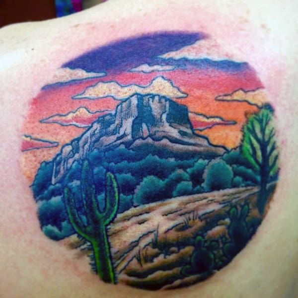 Man With Back Of Shoulder Cactus Desert Road Tattoo Design