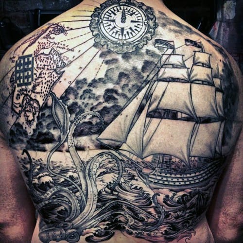 Man With Back Tattoo Of Squid In Ocean Sea And Sailing Ship In Black Ink