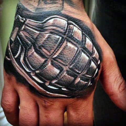 Man With Badass Hand Grenade Tattoo On Hands