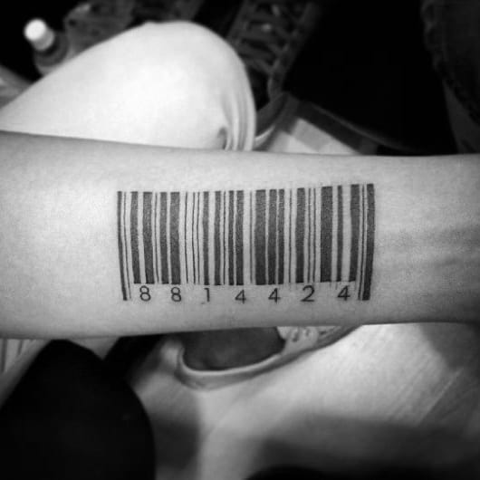 Man With Barcode Tattoo On Inner Forearm