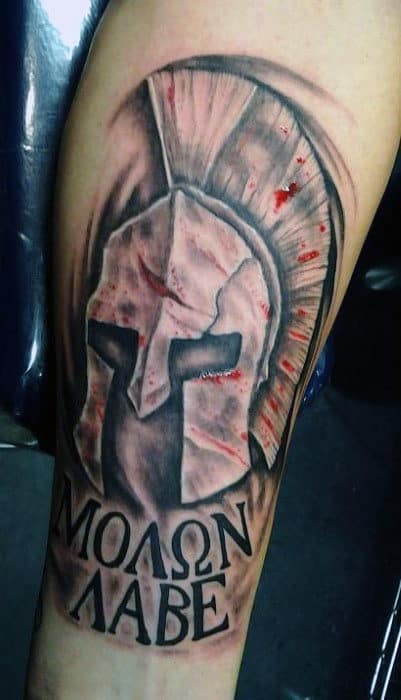Man With Battle Helmet Molon Labe Tattoo On Inner Forearm