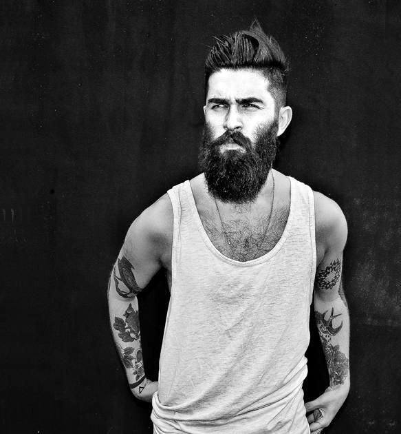 Man With Beard And Cool Undercut Hairstyle Medium Length