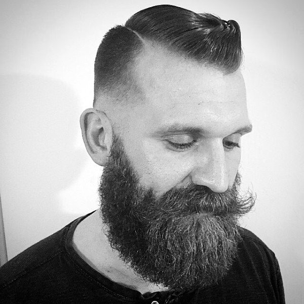 Man With Beard And Skin Fade Comb Over Haircut