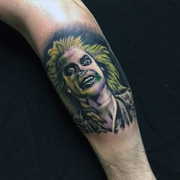 Man With Beetlejuice Leg Calf Tattoo