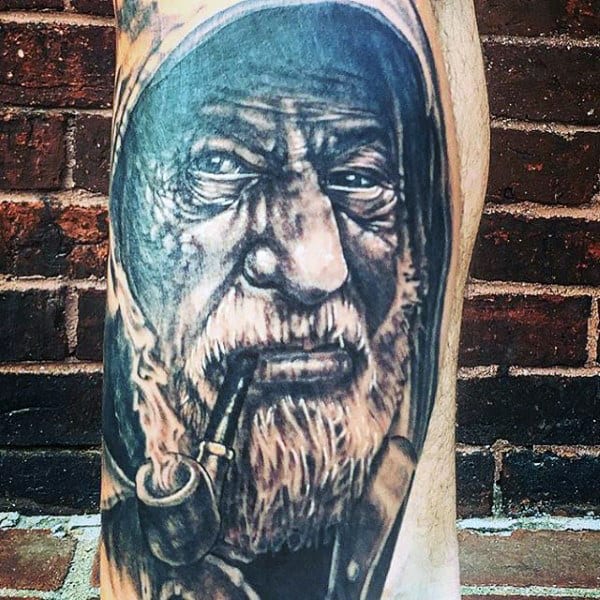 Man With Best Sailor Tattoos Smoking Pipe