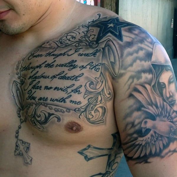 Man With Bible Verses Tattoos On Upper Chest
