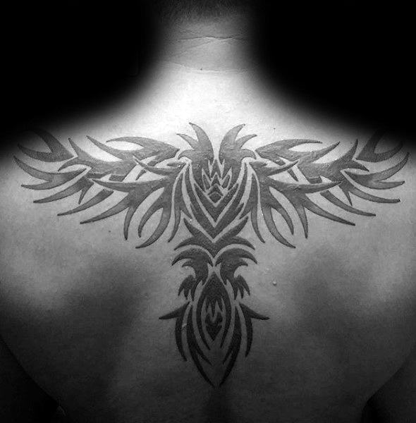 Man With Black Ink Back Tribal Eagle Tattoo
