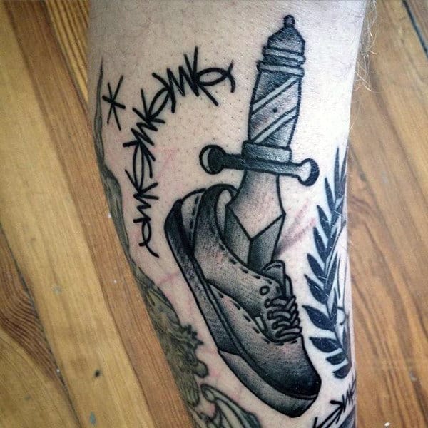 Man With Black Ink Barbed Wire Old School Tattoo On Leg