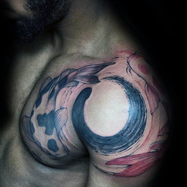 Man With Brush Stroke Fish Shoulder Tattoo