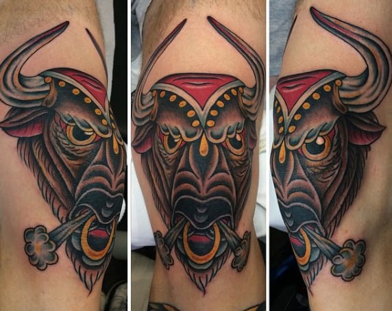 Man With Bull Horn Tattoo In Color Ink