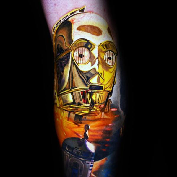 Hyper-realistic C-3PO and R2-D2 tattoo with reflective gold details and a desert backdrop, capturing a cinematic Star Wars scene.