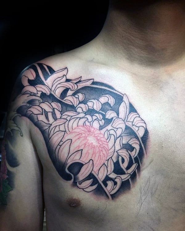 Man With Chrysanthemum Flower Chest Tattoo
