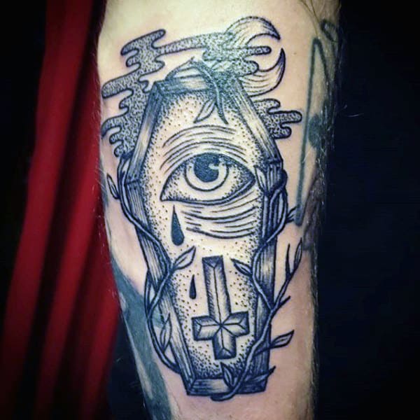 Man With Coffin Eye And Cross Tattoo