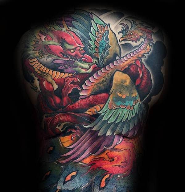 Man With Colorful Full Back Phoenix Themed Tattoo