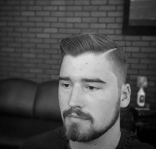 Man With Comb Over Fade Short Length Parted