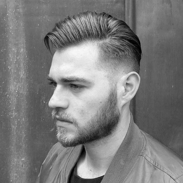 Man With Comb Over Low Fade Hairstyle