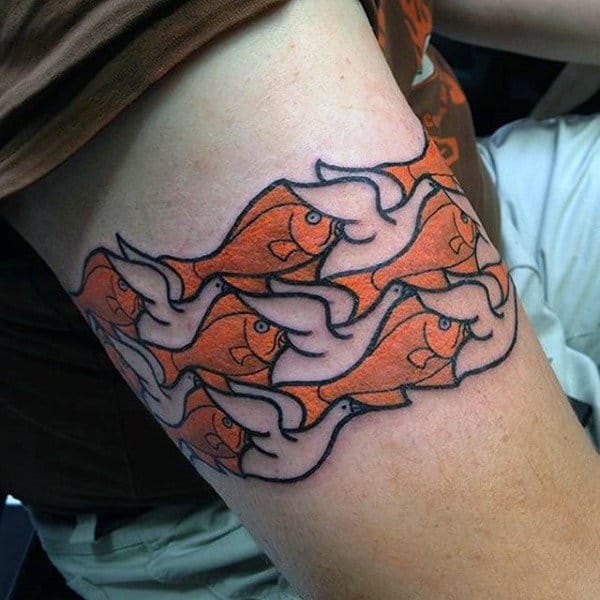 Man With Cool Armband Tattoos Of Swimming Fish Design