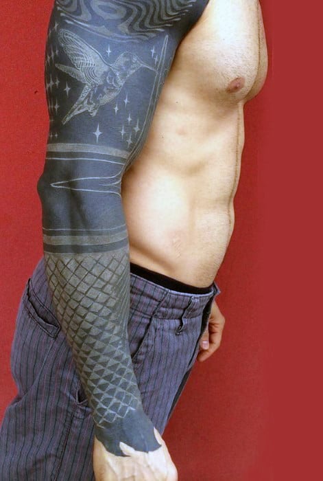 Man With Cool Blackwork Negative Space Full Sleeve Tattoos