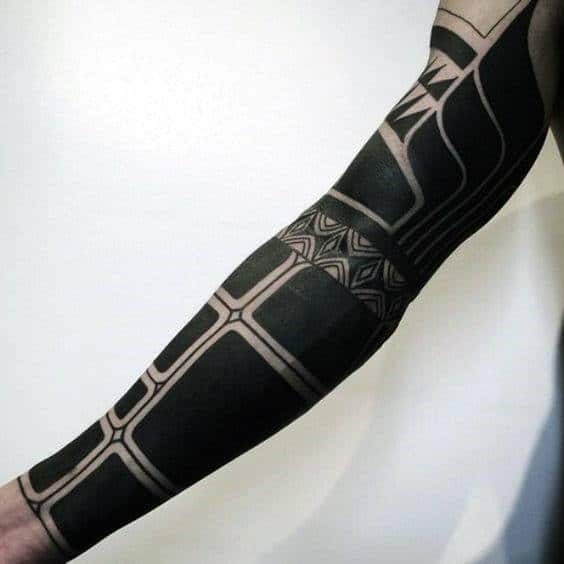 Man With Cool Blackwork Sleeve Tattoo