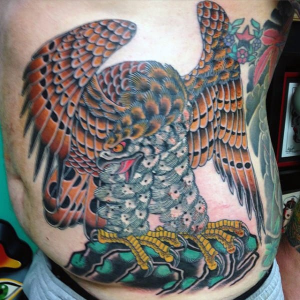 Man With Cool Colorful Stomach Tattoo Of Hawk