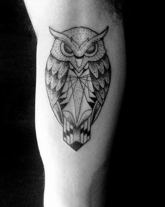 Man With Cool Geometric Owl Inner Arm Bicep Tattoo Design