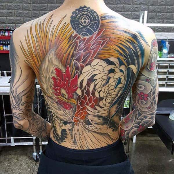 Man With Creative Rooster And Snake Tattoo On Back