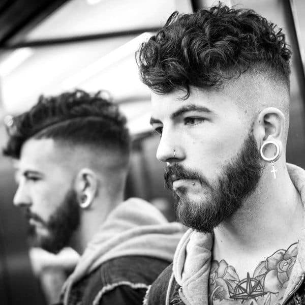 Man With Curly Undercut Hairstyle Medium Length