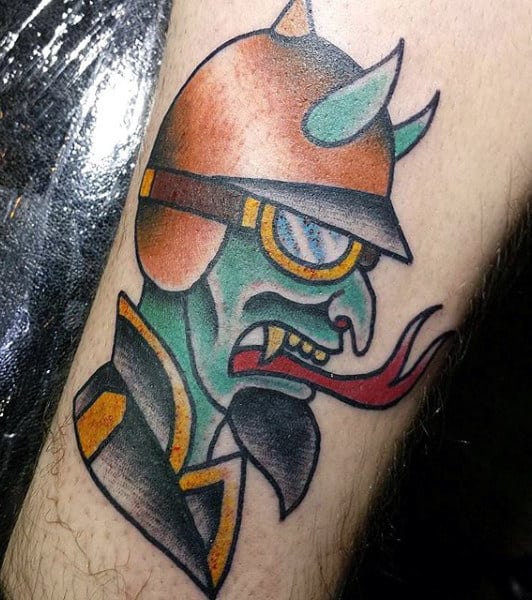 Man With Demon Faces Tattoos