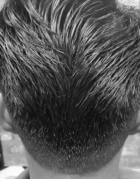 Man With Ducktail Hair Cut Medium Length
