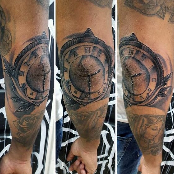 Man With Elbow Clock Tattoos