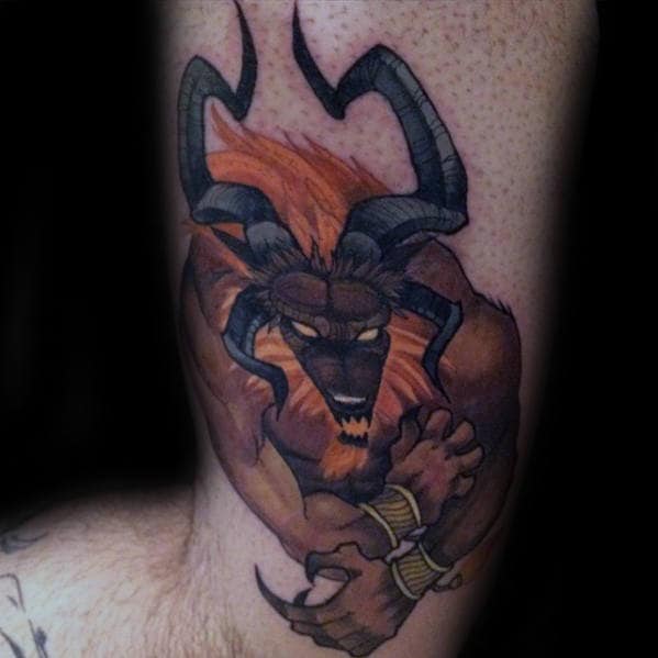 man with final fantasy ifrit tattoo on arm