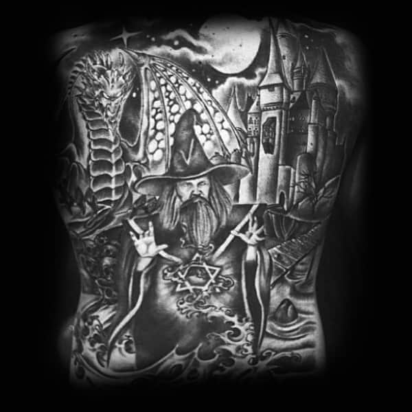 Man With Full Back Castle Wizard And Dragon Tattoo