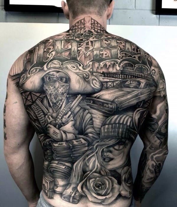 Man With Full Back Chicano Tattoo Designs