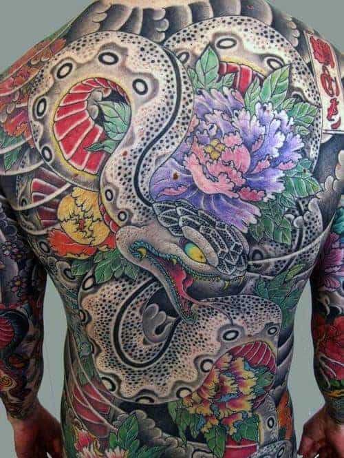 man-with-full-back-flower-japanese-snake-tattoos