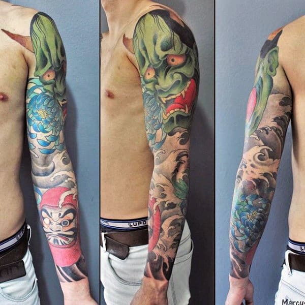Man With Full Sleeve Demon Mask And Daruma Doll Tattoo Japanese Design