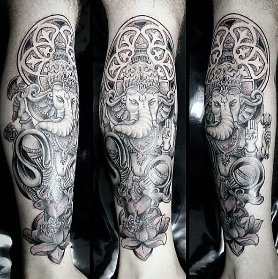 Man With Ganesh Lower Leg Tattoo Design