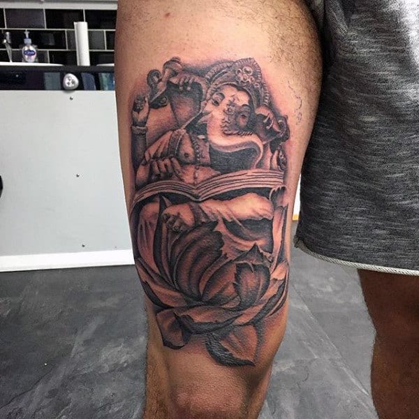 Man With Ganesh Thigh Tattoo