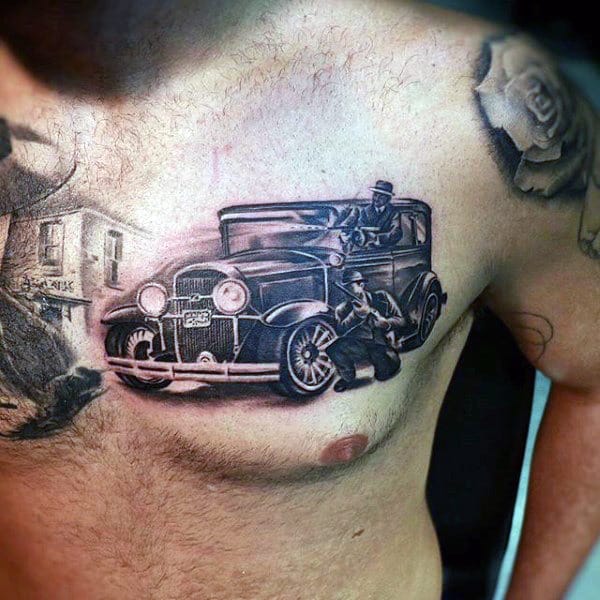 Man With Gangster Tattoo On Upper Chest