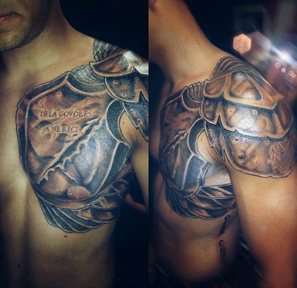 Tattoo of detailed gladiator armor covering chest and shoulder on man's upper body