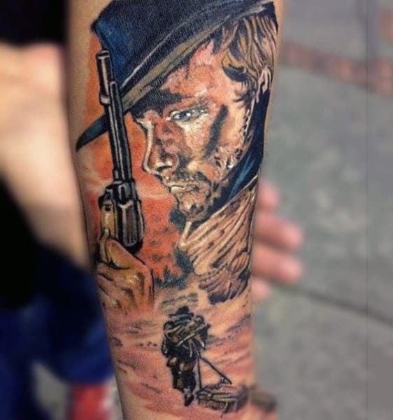 Man With Gorgeous Watercolor Tattoo Of Man Holding Pistol On Forearm