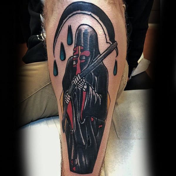 Man With Grim Reaper Shin Tattoos