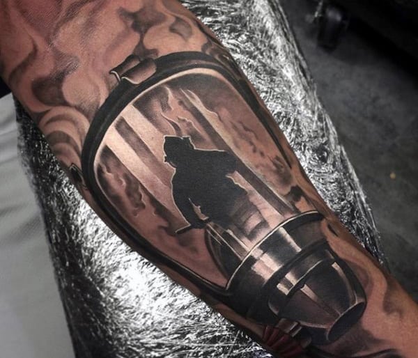 Man With Half Sleeve Mask Firefighter Tattoos