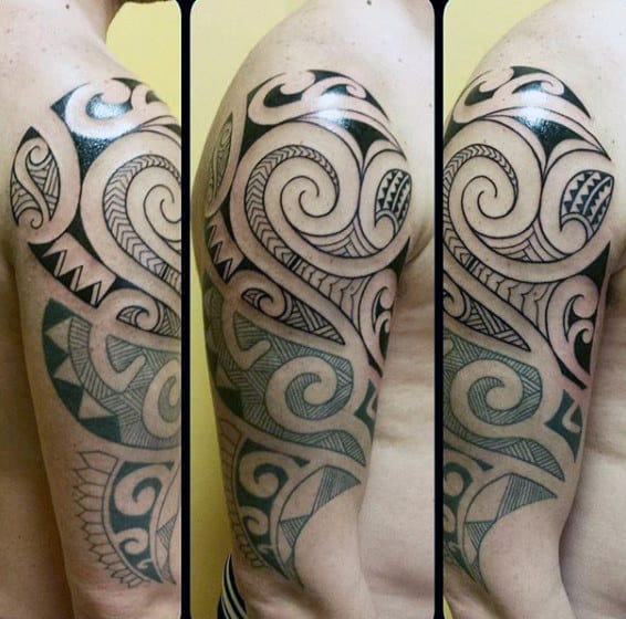 Man With Half Sleeve Of Maori Tattoo Design