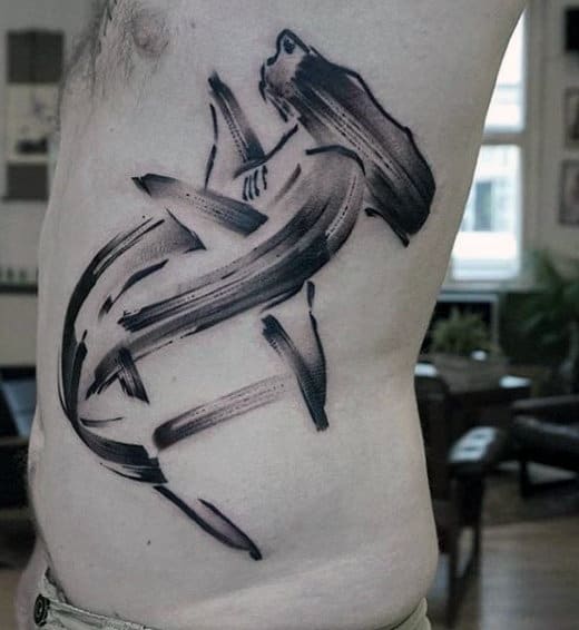 Man With Hammerhead Shark Tattoos On Ribcage