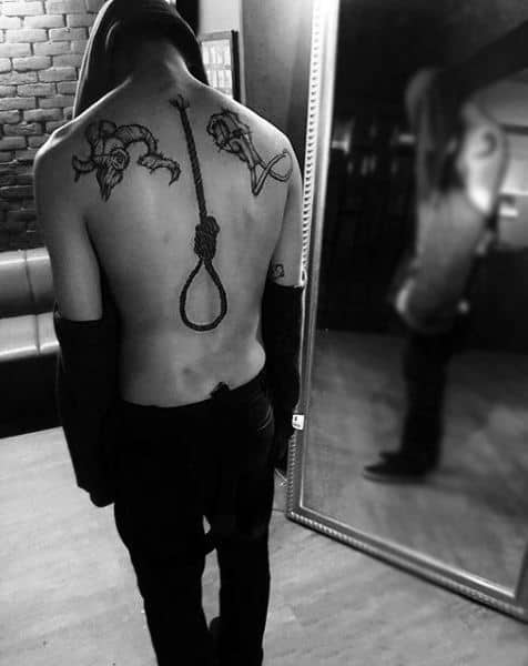 Man With Hanging Rope Spine Tattoo