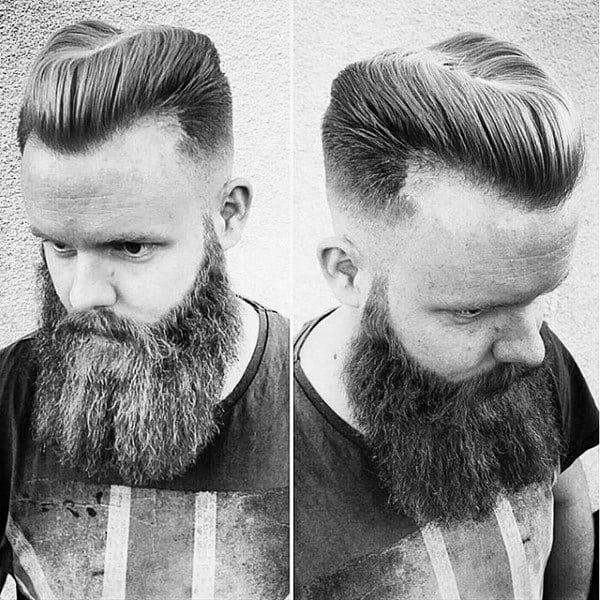 Man With Horseshoe Haircut Beard And Skin Fade Sides