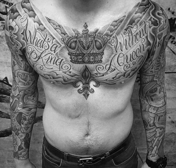 Man With Impressive Crown Tattoo And Wordings Chest