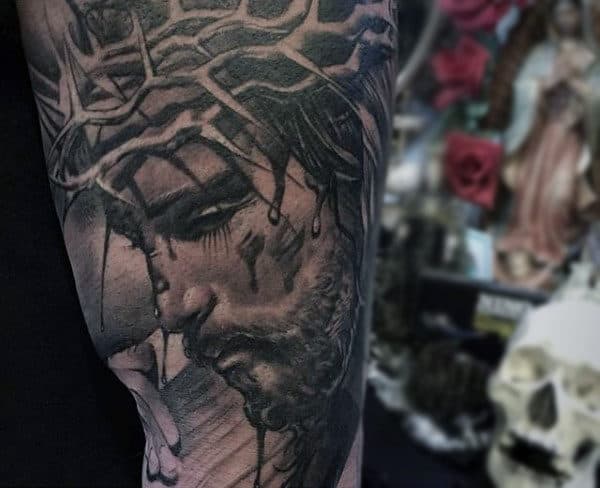 Man With Incredible Jesus Sleeve Tattoo