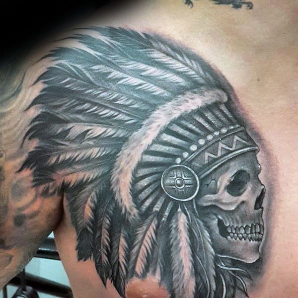 Man With Indian Skull Upper Chest Tattoo